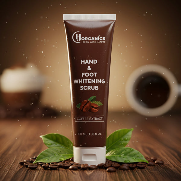Tube of H Organics Hand & Foot Whitening Scrub with coffee beans and leaves on a wooden surface.
